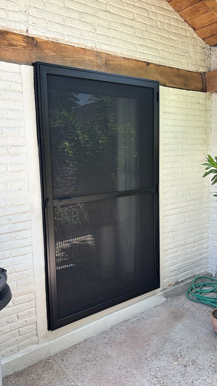 Mosquitero salida a patio trasero